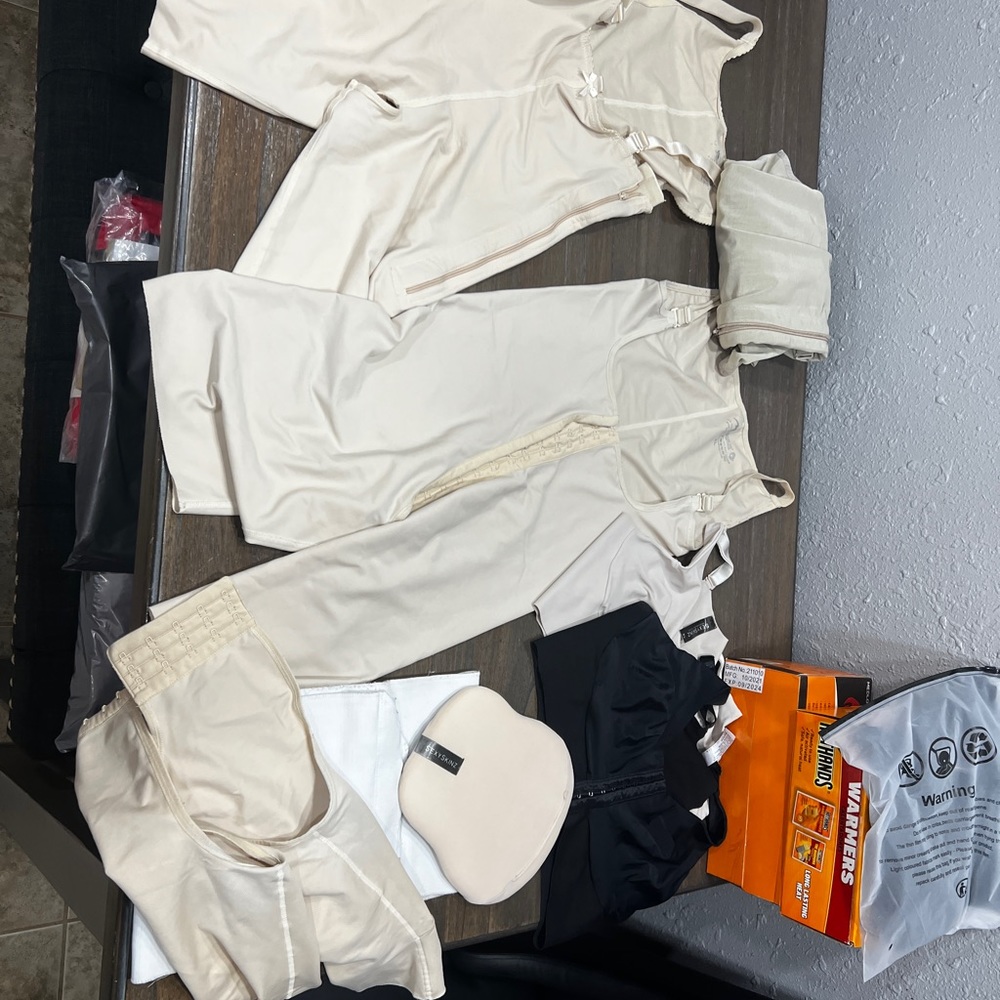 Several pieces of post breast surgery and body sculpting recovery garments.